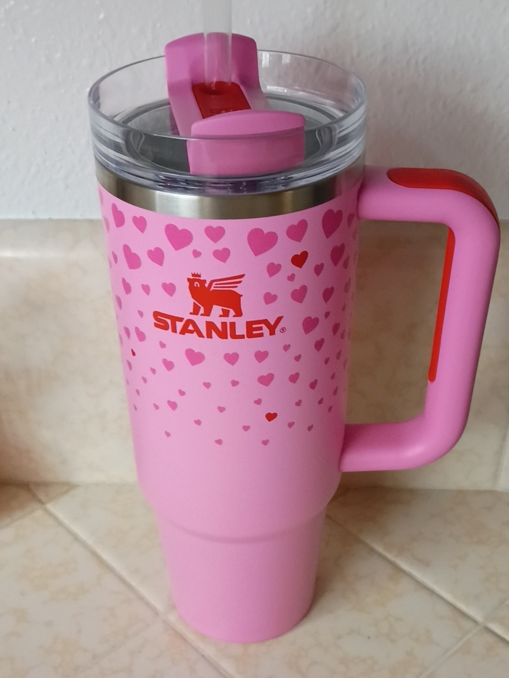 Stanley Pink Travel Mug with Red Logo and Heart Pattern Accent